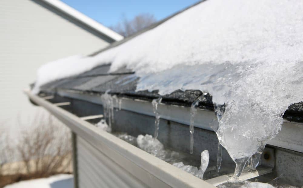 One way to prevent ice dams and buildup is to clean out your gutters prior to winter.